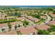 Aerial view of a lush community with ponds, mature trees, and well-maintained landscaping at 4026 Overture Cir # 487, Bradenton, FL 34209