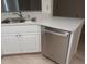 The kitchen features stainless steel appliances, including a dishwasher and double sink at 4154 Center Pointe Cir # 57A, Sarasota, FL 34233