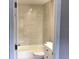 Bright bathroom featuring tub with white tile, and modern vanity at 5178 Lake Village Drive # 86, Sarasota, FL 34235