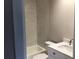 Modern bathroom featuring tub with white tile and contemporary vanity at 5178 Lake Village Drive # 86, Sarasota, FL 34235