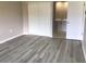 Bedroom with new flooring, large closet and attached bathroom at 5178 Lake Village Drive # 86, Sarasota, FL 34235