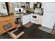 This kitchen has white appliances, sink with window, and plenty of cabinet space at 5233 Kenwood Ave, Sarasota, FL 34234