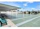 Outdoor shuffleboard courts are shaded by overhead structures and feature benches for spectators at 5233 Kenwood Ave, Sarasota, FL 34234