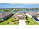 Lovely single-Gathering home offering a well-manicured lawn and picturesque waterfront views at 5327 Olano St, Palmetto, FL 34221