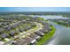Desirable home with a screened-in patio situated on a serene lakefront property in a lovely neighborhood at 5327 Olano St, Palmetto, FL 34221