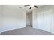 Empty bedroom with a view of the closet, hall, and doorway to other rooms at 5327 Olano St, Palmetto, FL 34221