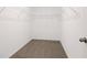 Walk in closet with carpet and metal shelving installed at 5327 Olano St, Palmetto, FL 34221