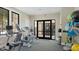 Fully-equipped gym with treadmills, ellipticals, and free weights, offering a convenient space for residents to stay active at 5327 Olano St, Palmetto, FL 34221