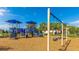 Fun community playground including slides and swings with a protective mulch ground covering at 5327 Olano St, Palmetto, FL 34221