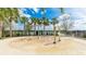 Fun community splash pad area with playful water features, bordered by palm trees, offering an exciting outdoor activity at 5327 Olano St, Palmetto, FL 34221
