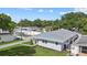 Aerial view of the home and the backyard, showing the privacy fence and driveway at 5718 Magnolia N St, St Petersburg, FL 33703