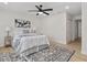 Comfortable bedroom with a ceiling fan, soft lighting, and a stylish rug at 5718 Magnolia N St, St Petersburg, FL 33703