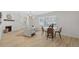 Cozy living area with a fireplace, stylish furnishings, and plenty of natural light at 5718 Magnolia N St, St Petersburg, FL 33703