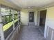 Bright sunroom with many windows awaiting renovation at 675 El Centro # 675, Longboat Key, FL 34228