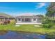 This home has a large screened lanai and serene water views of the backyard pond at 7005 Goldrush Ln, Bradenton, FL 34201