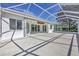 Spacious lanai extends from the home's exterior, offering ample space for outdoor relaxation at 7005 Goldrush Ln, Bradenton, FL 34201
