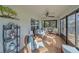 This sunroom is cozy and inviting, offering comfortable seating and views of the outdoors at 8755 Dolomite Ave, North Port, FL 34287