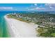Panoramic aerial view highlights beach access and the surrounding neighborhood at 925 Beach Rd # 408, Sarasota, FL 34242