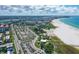 Panoramic aerial view of the beach, parking lot, and community at 925 Beach Rd # 408, Sarasota, FL 34242