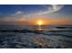 Tranquil beach sunset reflecting on the waves of Siesta Key's pristine beach at 925 Beach Rd # 408, Sarasota, FL 34242