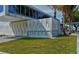 Siesta Beach building with sleek architecture and Siesta Beach sign on the exterior at 925 Beach Rd # 408, Sarasota, FL 34242