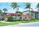 Charming community building with lush landscaping, showcasing available condos for sale at 925 Beach Rd # 408, Sarasota, FL 34242