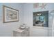 View into the dining and living area, showcasing the open floor plan and coastal design at 925 Beach Rd # 408, Sarasota, FL 34242