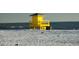 Beach safety enhanced with a lifeguard stand overseeing the tranquil water at 925 Beach Rd # 408, Sarasota, FL 34242