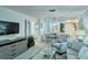 Cozy living room with an open-concept layout, coastal decor, and a comfortable, inviting atmosphere at 925 Beach Rd # 408, Sarasota, FL 34242