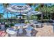 Community area offering picnic tables, benches, and grills to enjoy the Florida weather at 925 Beach Rd # 408, Sarasota, FL 34242