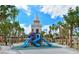 Fun Siesta Beach playground featuring slides and a castle, perfect for  at 925 Beach Rd # 408, Sarasota, FL 34242