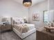 Relaxing bedroom with soft lighting, plush bedding, and stylish decor that creates a calm and inviting space at 1166 Blue Shell Loop, Sarasota, FL 34240