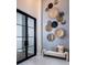Welcoming entryway with modern decor and bench seating at 1166 Blue Shell Loop, Sarasota, FL 34240