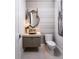 Stylish powder room with unique fixtures and elegant decor at 1166 Blue Shell Loop, Sarasota, FL 34240