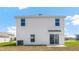 New two-story home with a blank canvas backyard, awaiting personal landscaping and design at 17386 Whiskey Creek Trl, Parrish, FL 34219