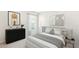 Serene bedroom with contemporary decor, offering a relaxing and stylish retreat at 1774 Cobb Trl, Parrish, FL 34219