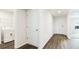 Functional laundry room with modern appliances and ample storage space at 1774 Cobb Trl, Parrish, FL 34219