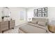 Cozy bedroom with stylish decor, comfortable furnishings, and ample natural light at 1926 Cobb Trl, Parrish, FL 34219