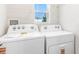 Laundry room with washer and dryer at 1926 Cobb Trl, Parrish, FL 34219
