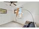 Comfortable bedroom with large window, stylish lighting, and a closet at 2303 28Th E Ave, Palmetto, FL 34221