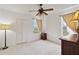 Bedroom features carpet, two windows, and closet with double doors at 2303 28Th E Ave, Palmetto, FL 34221