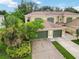 Two-story home with well-maintained landscaping and a two-car garage at 2303 28Th E Ave, Palmetto, FL 34221