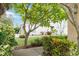 A verdant front yard boasting colorful landscaping, adding to the property's curb appeal at 2303 28Th E Ave, Palmetto, FL 34221