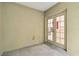 Enclosed patio with double doors leading to the interior at 2303 28Th E Ave, Palmetto, FL 34221
