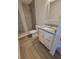 Stylish bathroom boasts a tiled shower, granite vanity, and tiled floor at 328 20Th W St, Palmetto, FL 34221