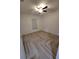 Neutral bedroom featuring stylish wood-look tile flooring and a ceiling fan for added comfort at 328 20Th W St, Palmetto, FL 34221