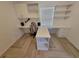 Bright home office with built-in shelves and cabinets, perfect for remote work and organization at 328 20Th W St, Palmetto, FL 34221
