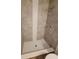 Walk-in shower with decorative tile and brushed-nickel shower fixtures at 328 20Th W St, Palmetto, FL 34221