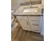 Bathroom features granite counters, under-sink storage, and stainless fixtures at 328 20Th W St, Palmetto, FL 34221