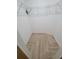 Practical walk-in closet with sturdy wire shelving and herringbone-pattern tile flooring at 328 20Th W St, Palmetto, FL 34221